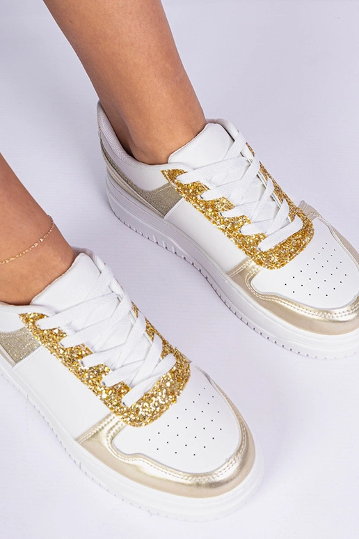 Kuldsete naiste snekerid paksul... Kuldsete naiste snekerid paksul...