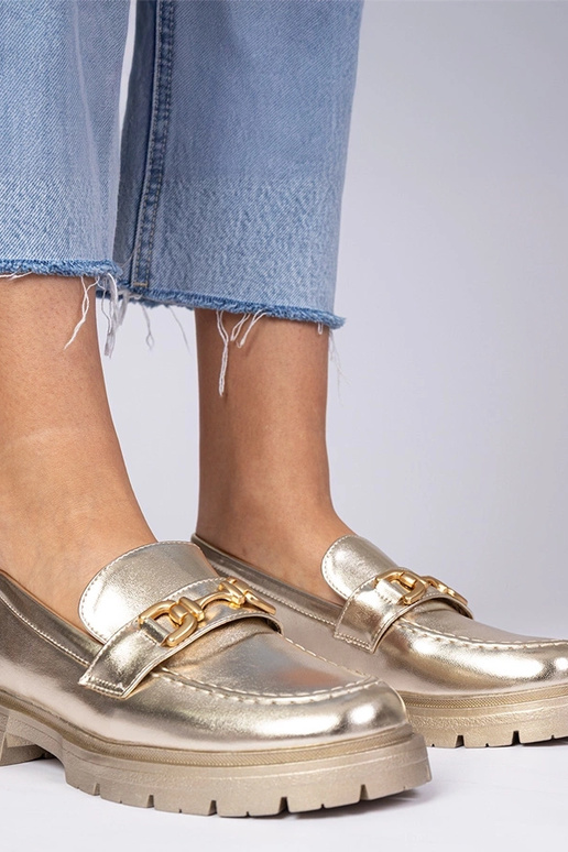 Kuldne elegantne mokasiin tehisnahast...