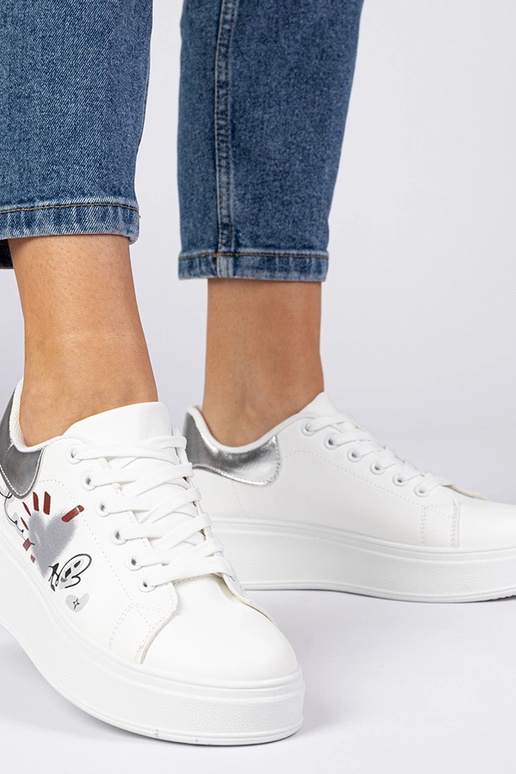 Valge-hõbedased naiste spordijalatsid... Valge-hõbedased naiste spordijalatsid...