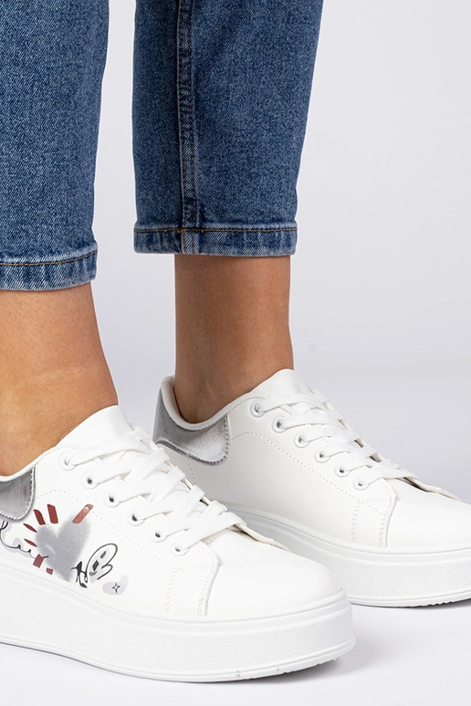 Valge-hõbedased naiste spordijalatsid... Valge-hõbedased naiste spordijalatsid...