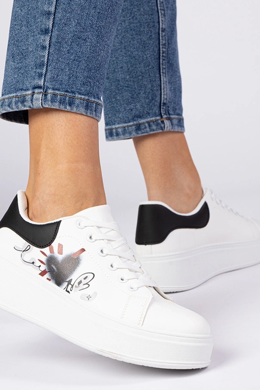 Valge-mustad naiste spordijalatsid...