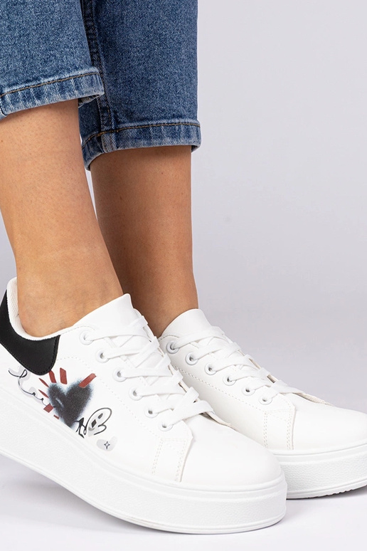 Valge-mustad naiste spordijalatsid...