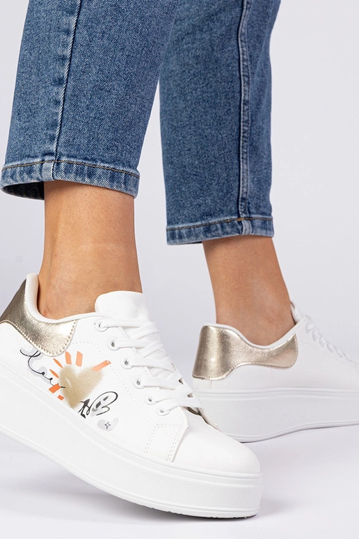 Valge-kuldne naiste spordijalatsid... Valge-kuldne naiste spordijalatsid...