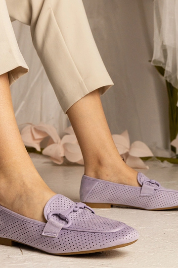 Lillad naiste augu-mustriga...