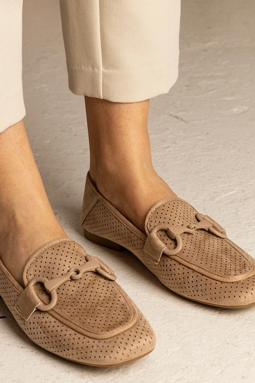 Pruunid naiste augu-mustriga...