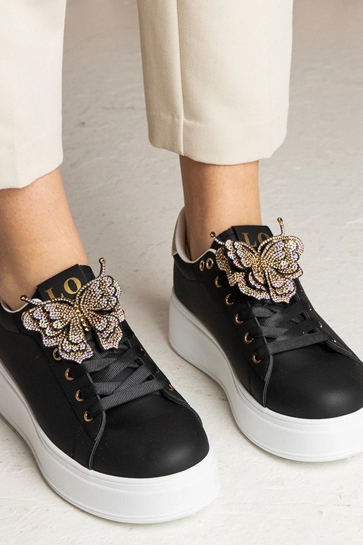 Kariba mustad tossud liblikaga ja... Kariba mustad tossud liblikaga ja...