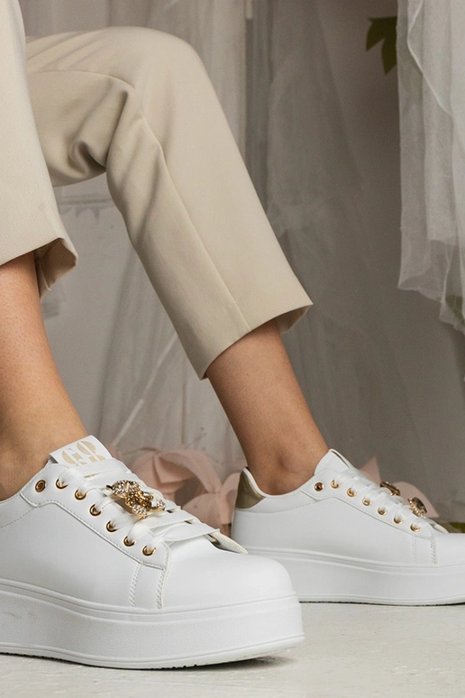 Valge-kuldne naiste jalatsid kivide...