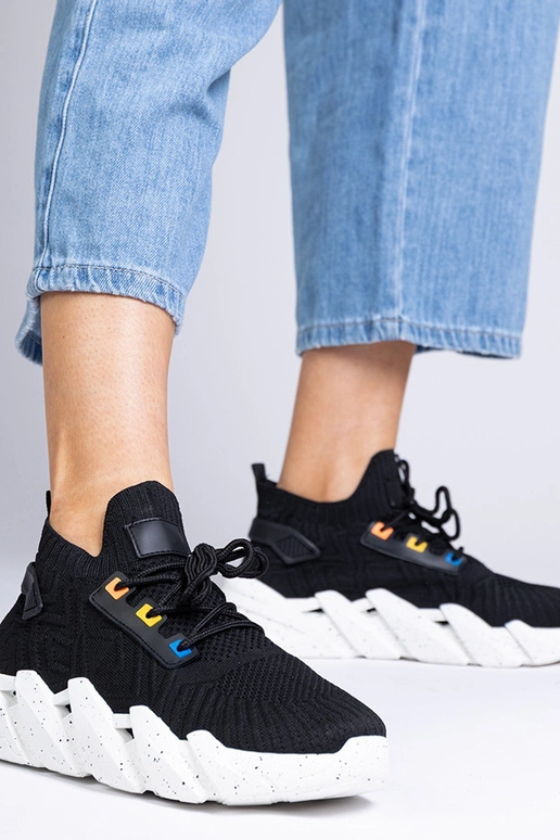 Mustad naiste sportlikud tossud paksu... Mustad naiste sportlikud tossud paksu...