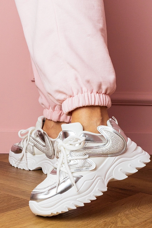 Valged naiste spordijalatsid paksul...