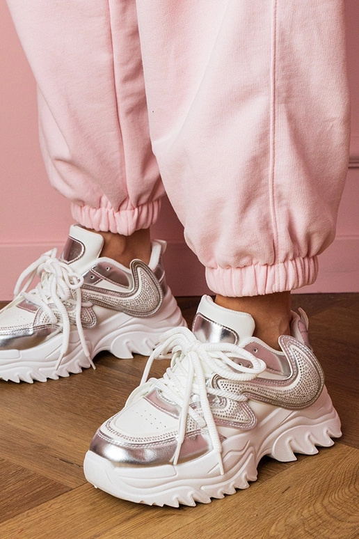 Valged naiste spordijalatsid paksul...