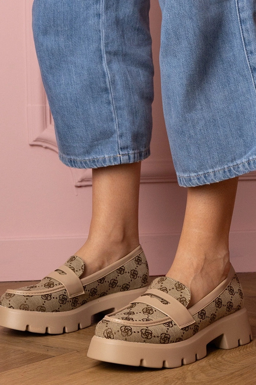 Pruunid naiste mokasiinid tikandiga...