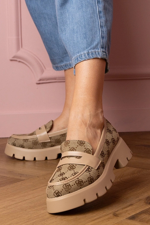 Pruunid naiste mokasiinid tikandiga...