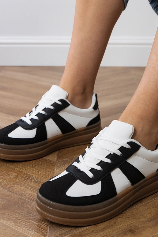 Mustad naiste spordijalatsid...