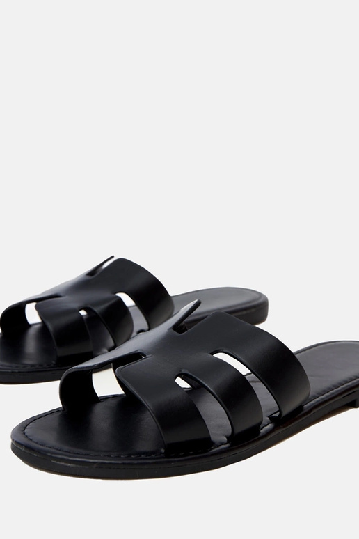 Mustad sussid lõigetega Ragos