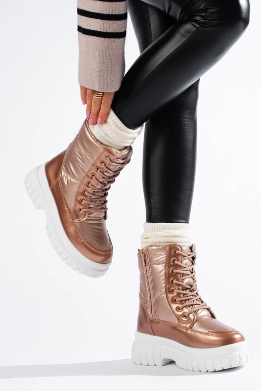 Kuldset värvi Pealiste lumesaapad... Kuldset värvi Pealiste lumesaapad...