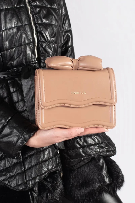 Vähe beež elegantne käekott vibuga