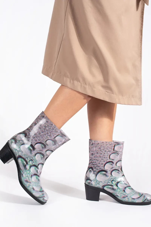 Kummikud sisse krople kõrgetel kontsadel