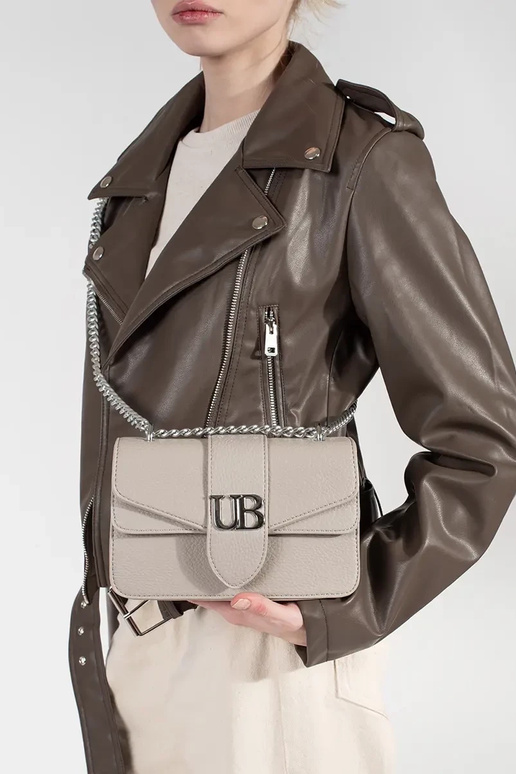 Elevandiluust värvi väike naiste kott... Elevandiluust värvi väike naiste kott...