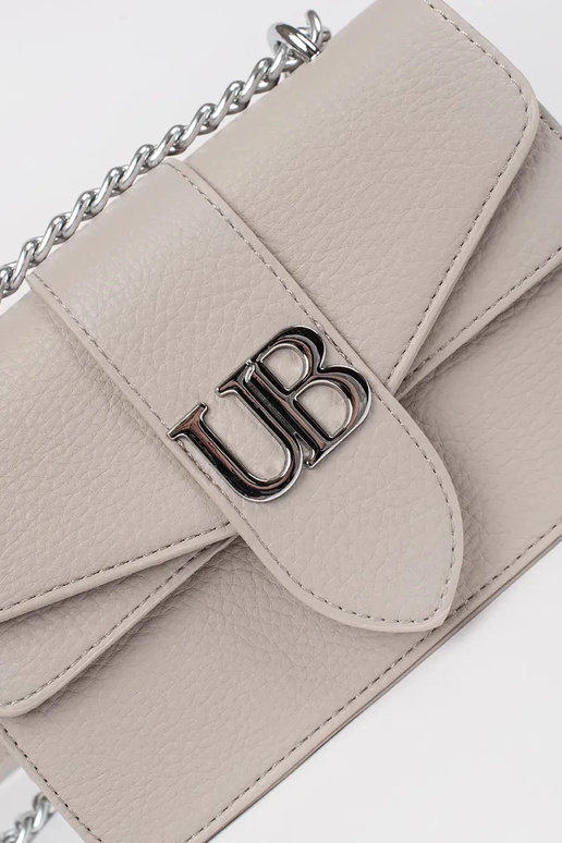 Elevandiluust värvi väike naiste kott... Elevandiluust värvi väike naiste kott...