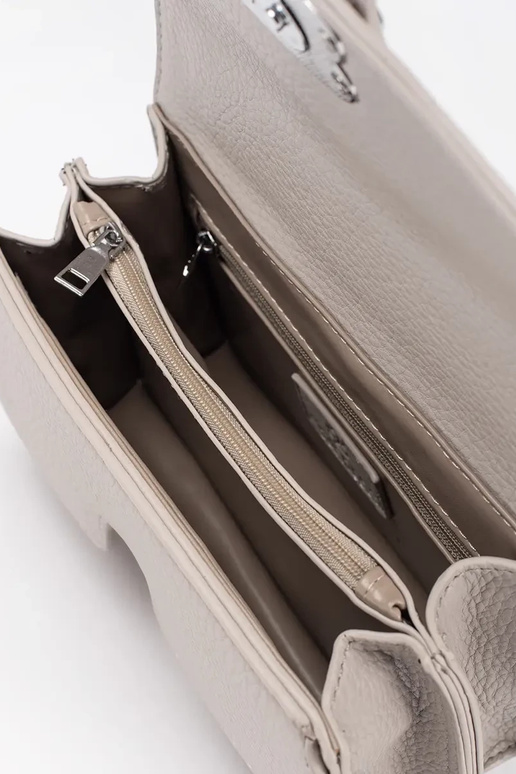 Elevandiluust värvi väike naiste kott... Elevandiluust värvi väike naiste kott...