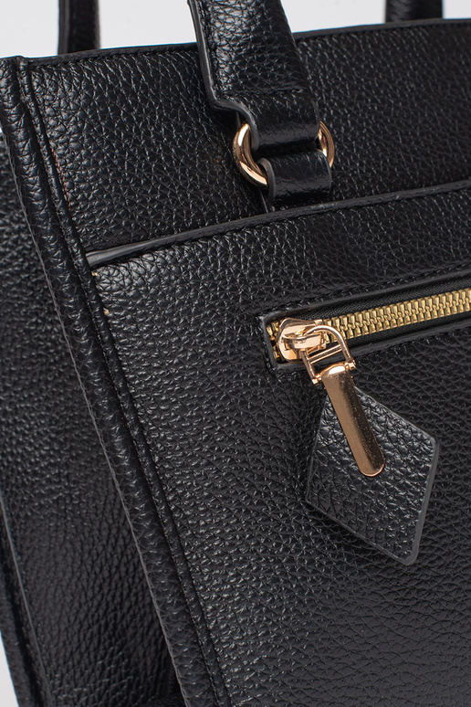 Must käekott lukuga