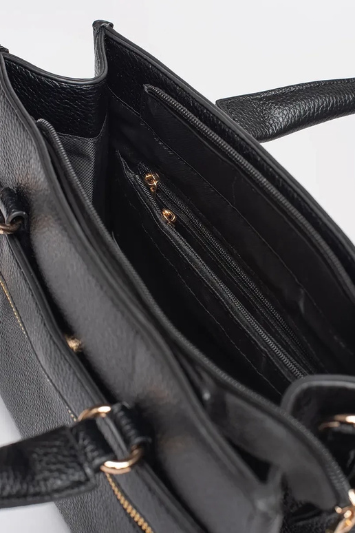 Must käekott lukuga