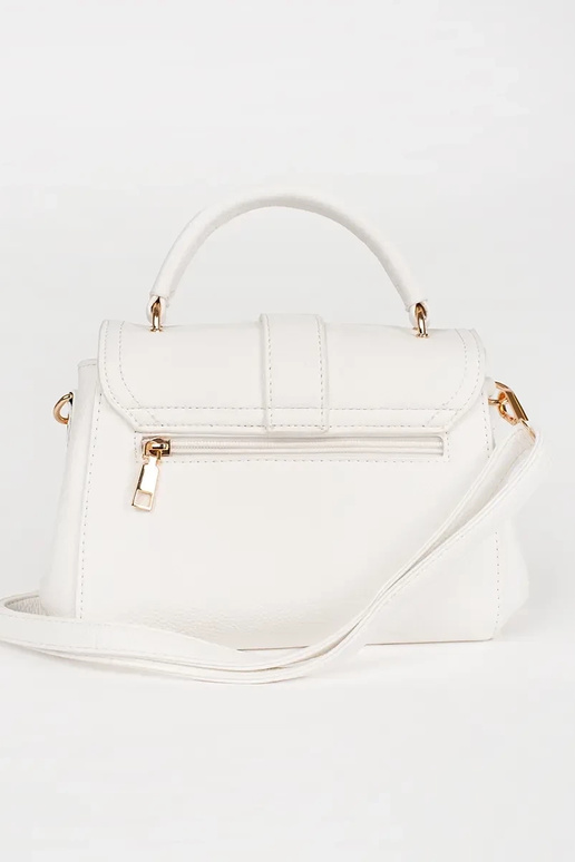 Valge väike käekott kuldsete...