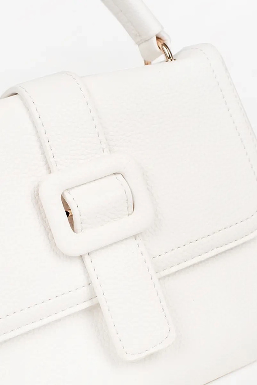 Valge väike käekott kuldsete...