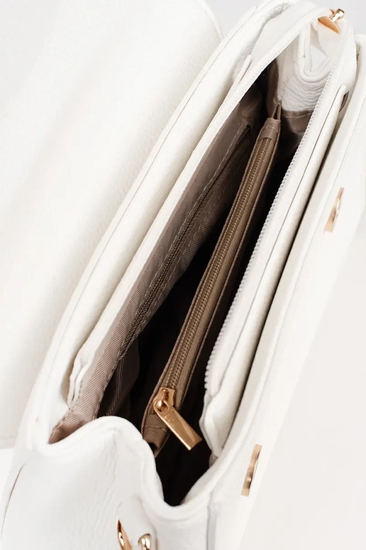 Valge väike käekott kuldsete...