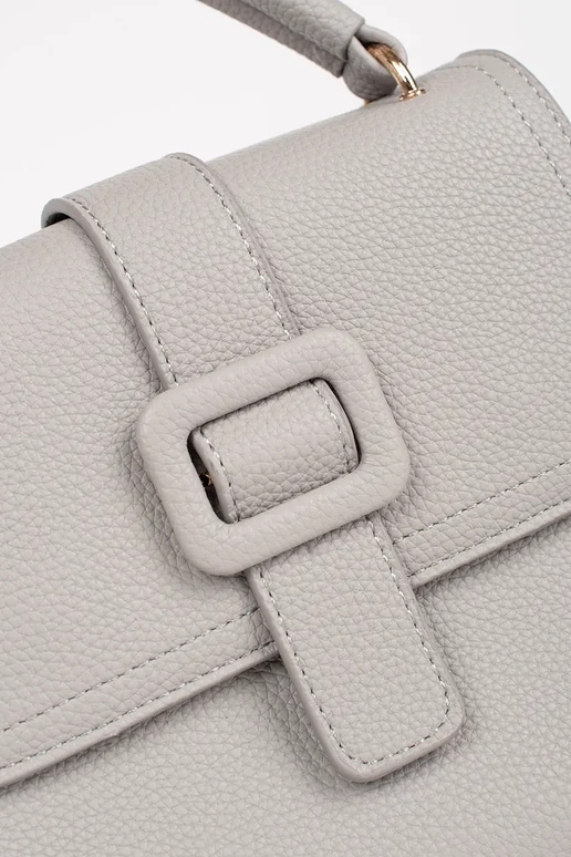 Hall väike käekott kuldsete elementidega