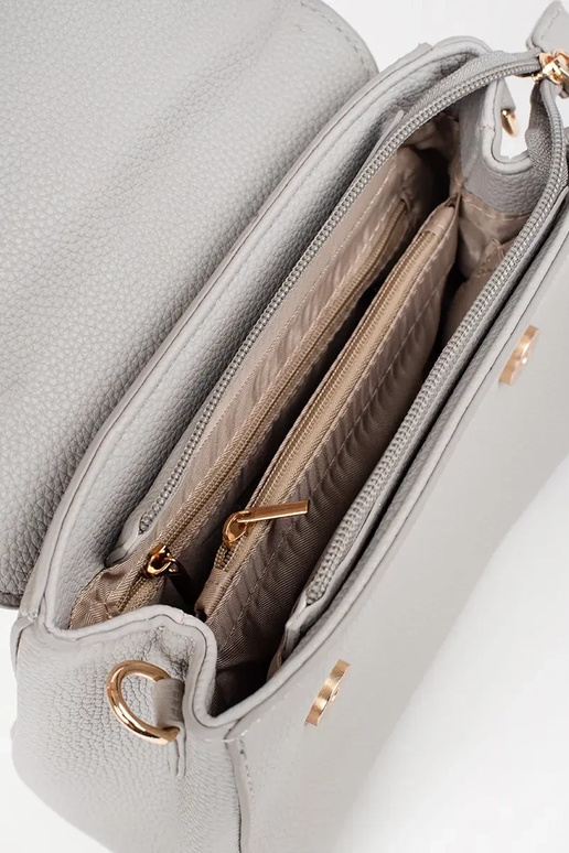 Hall väike käekott kuldsete elementidega