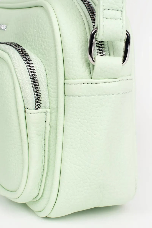 roheline väike kott taskutega