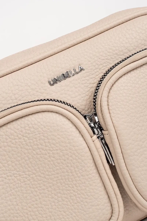 Elevandiluust värvi väike käekott...