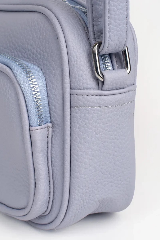 Lilla väike käekott taskutega