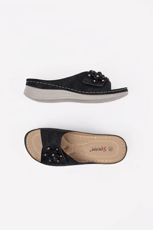 Mustad naiste sussid paksul tallal