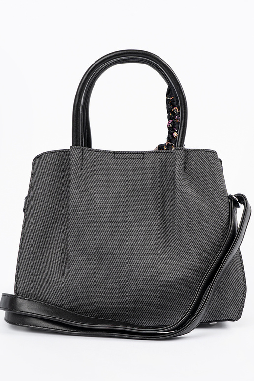 Must keskmise suurusega käekott...