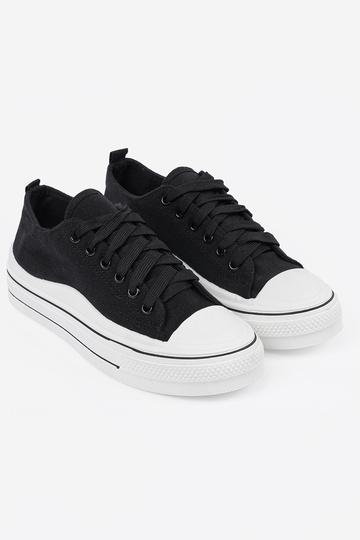 Mustade naiste jalatsid... 2