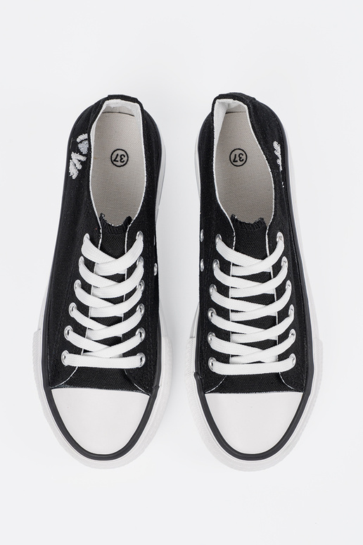 Mustade naiste vabaaja jalatsid...