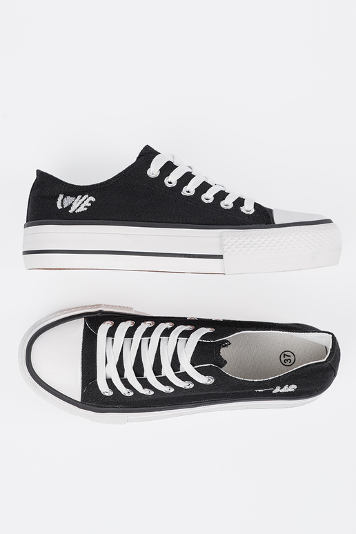 Mustade naiste vabaaja jalatsid...