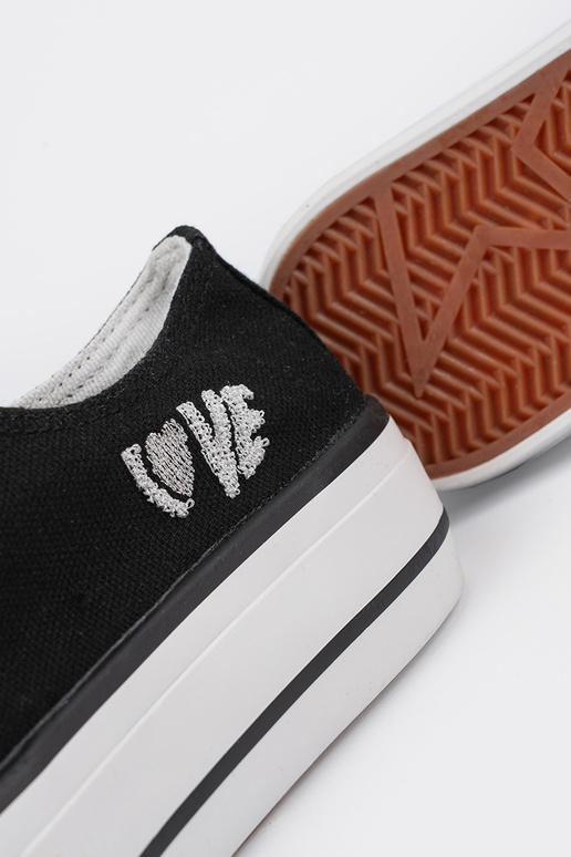 Mustade naiste vabaaja jalatsid...