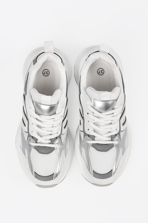 Valged naiste spordistiilis jalatsid...