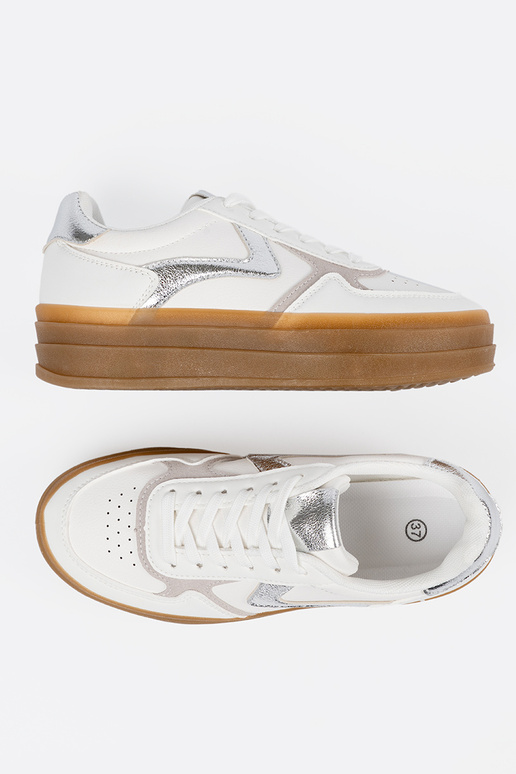 Valged naiste sportlikud kingad...