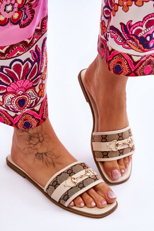 Klassikalise mudeli lamedad sandaalid beeži värvi Sellel onrlene