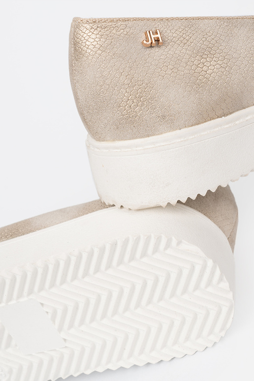 Kuldset värvi mokassiinid z biżuteryjnym detalem na przodzie