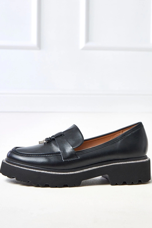 Mustad mokasiinid dekoratsiooniga ja...