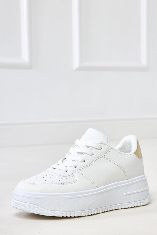 Valged spordijalatsid platvormiga ja... Valged spordijalatsid platvormiga ja...