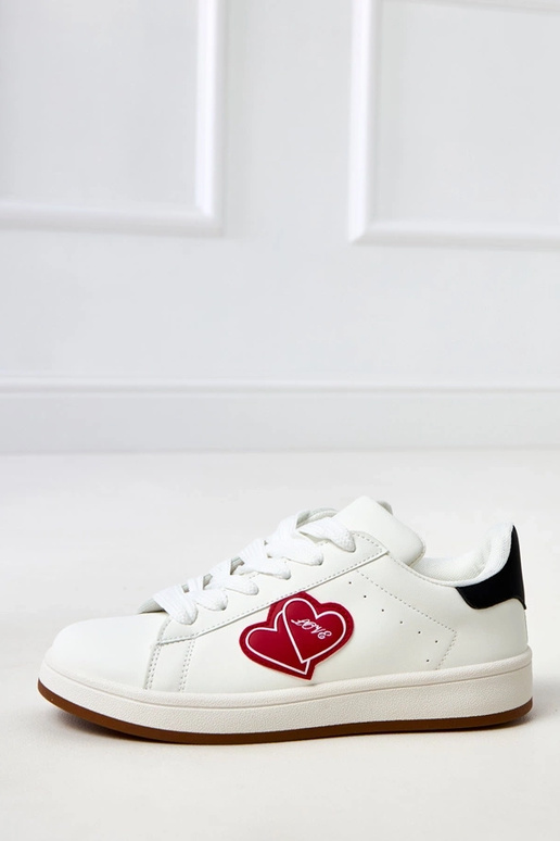 Valged spordijalatsid platvormiga ja... Valged spordijalatsid platvormiga ja...