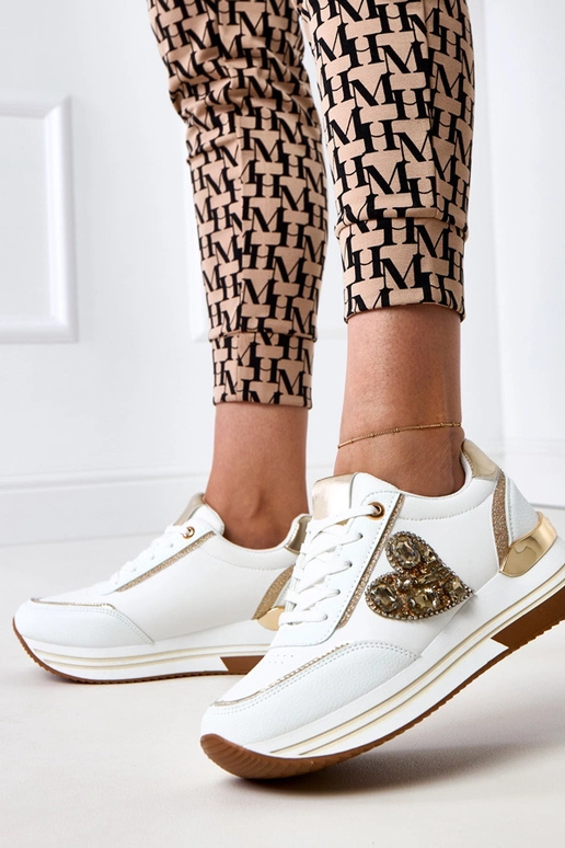 Valged spordijalatsid platvormiga... Valged spordijalatsid platvormiga...