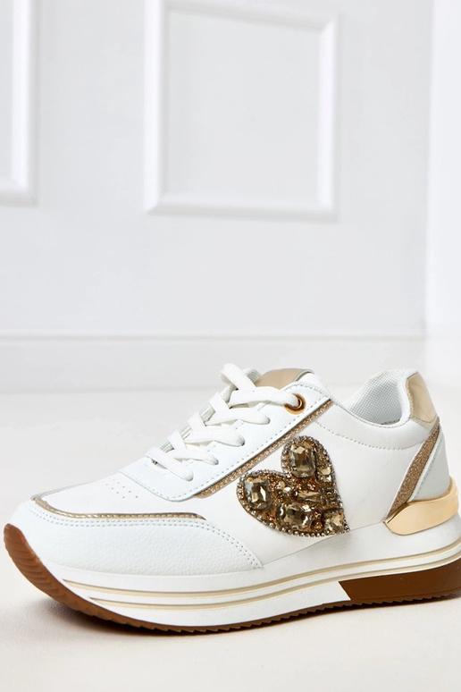 Valged spordijalatsid platvormiga... Valged spordijalatsid platvormiga...