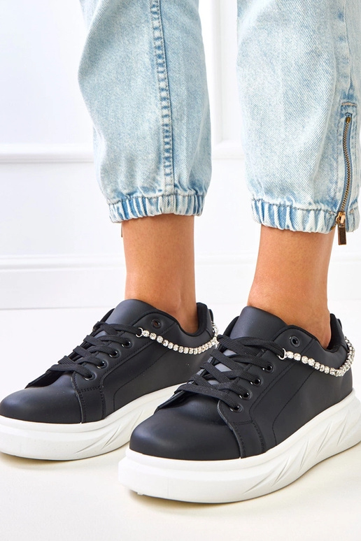 Mustad platvormi tossud dekoratiivse... Mustad platvormi tossud dekoratiivse...